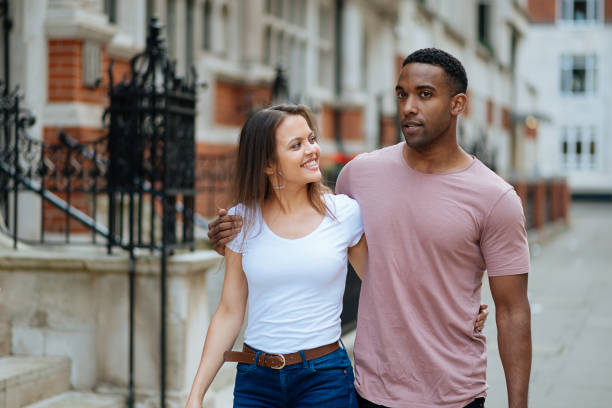 istock Loving multi ethnic couple in London going shopping 853522358