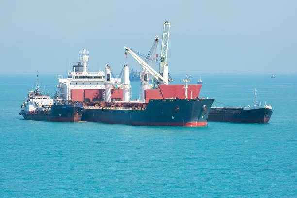 istock Transfer of the cargo at sea. 853528448