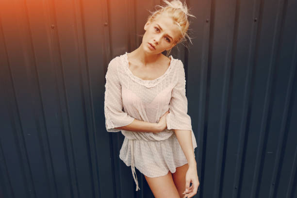 istock stylish girl blonde 853536062