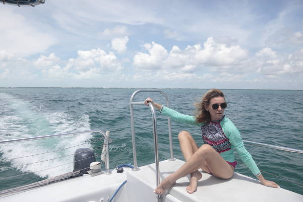 istock Woman on a boat. 853542134