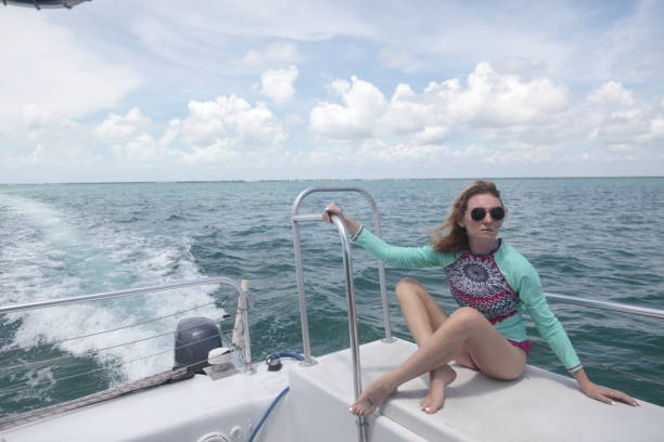 istock Woman on a boat. 853542484