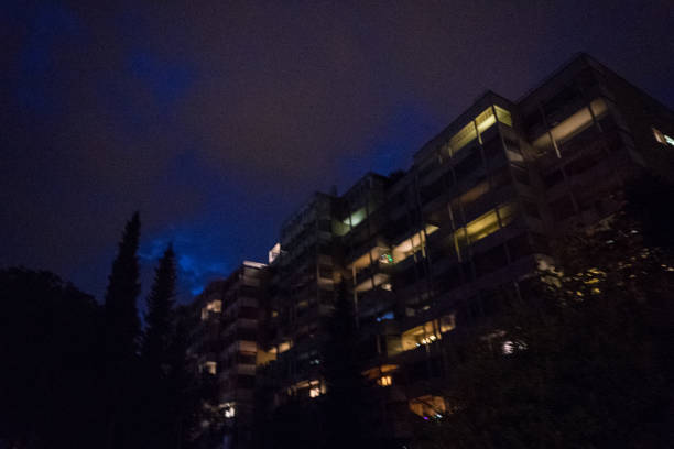 istock house night with lights on and violet cloudy sky illumination 853542626