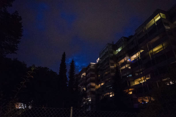 istock house night with lights on and violet cloudy sky illumination 853542692