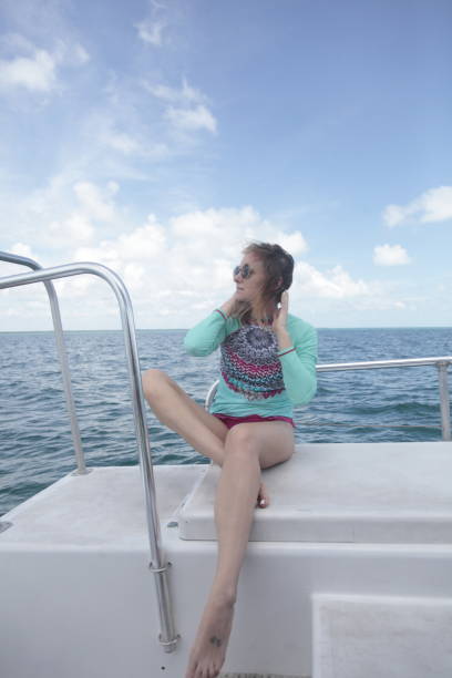 istock Woman on a boat. 853550088
