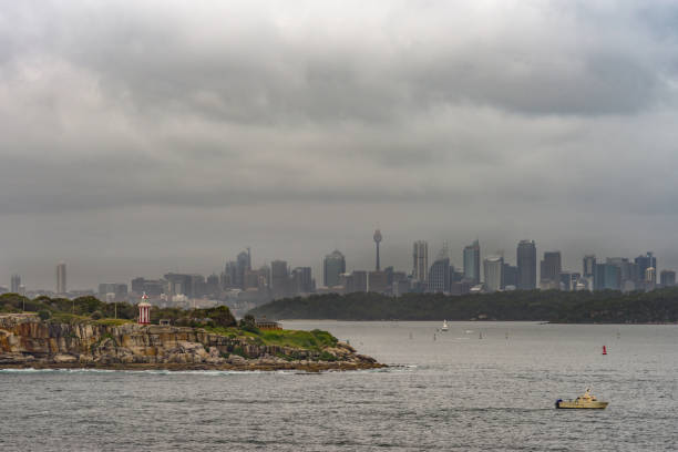Entering Sydney Harbor Bay with Sydney skyline, Australia. stock photo