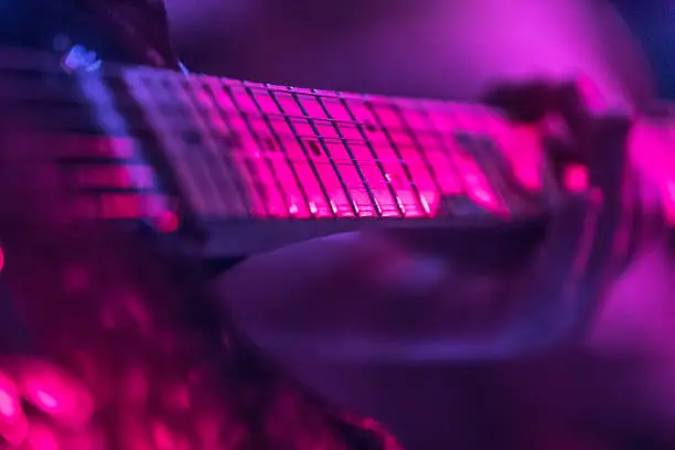 Playing e-guitar on stage