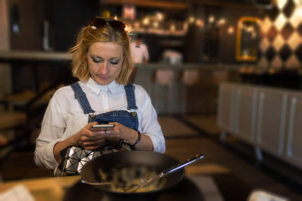 istock Young woman in restaurant 853569044