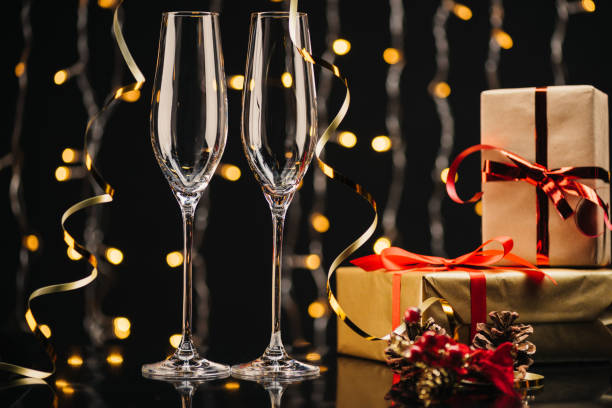 istock empty wineglasses and gifts 853575524