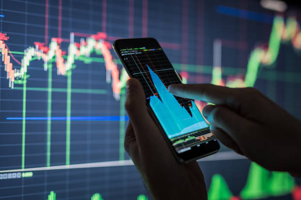 istock Businessman checking stock market data. 853584220