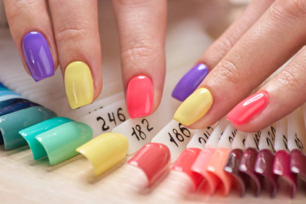 istock Beautiful summer manicure on female fingers. 853591312
