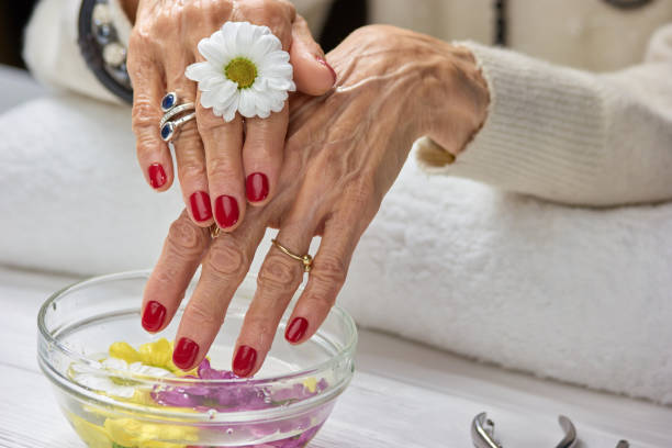 istock Woman with manicure in spa salon. 853597516