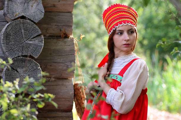 istock girl traditional dress log 853609078