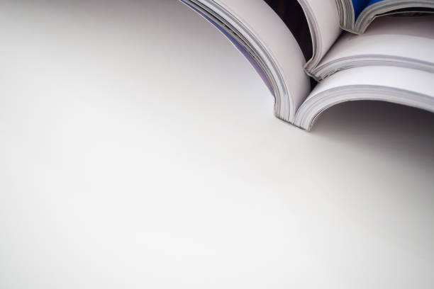 istock pile of magazines stack on white table in living room 853609728