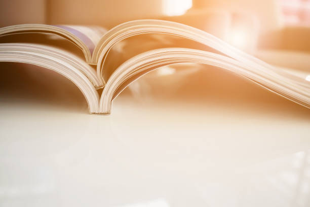 istock pile of magazines stack on white table in living room 853609730