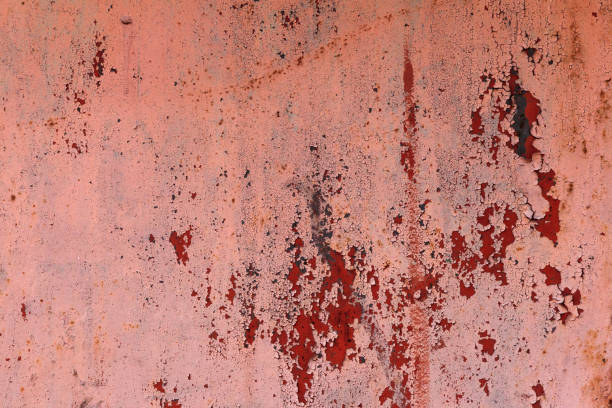 istock Old metal red painted background with streaks of rust for creativity, textures and backgrounds. 853610170