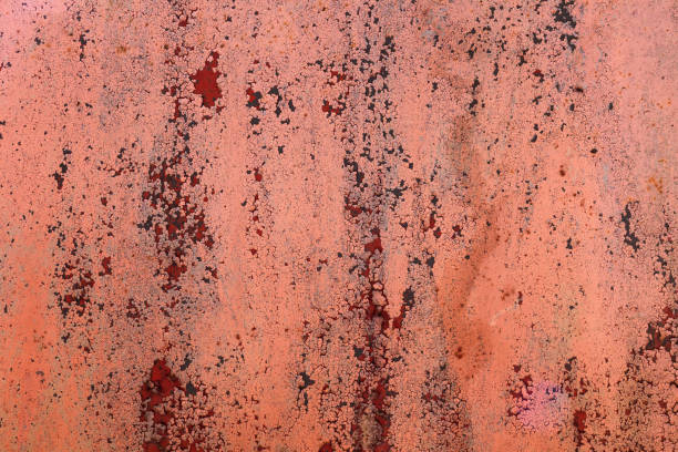 istock Old metal red painted background with streaks of rust for creativity, textures and backgrounds. 853610176