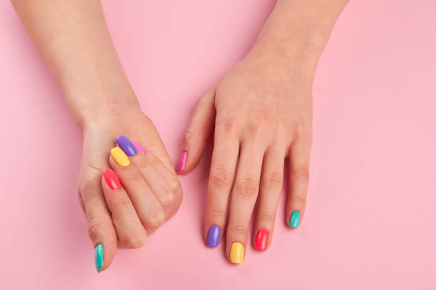istock Pastel manicure on female hands. 853610266