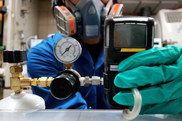 istock Instrument technician is take standard gas for the job calibrate or function check of personal gas tester or gas detector. 853643098