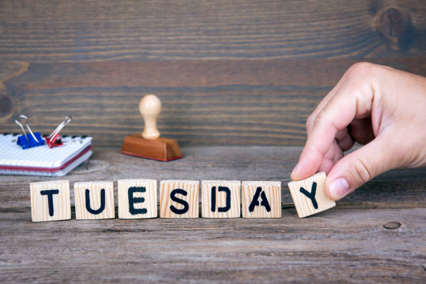 istock Tuesday. Wooden letters on the office desk, informative and communication background 853645456
