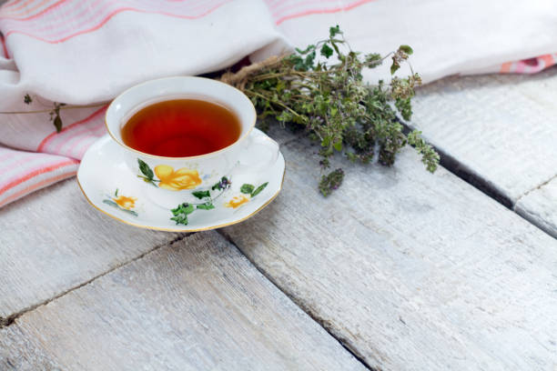 istock herbal tea on a white wooden background 853645818