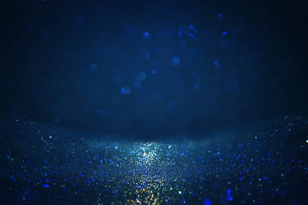 istock glitter vintage lights background. defocused. 853646466