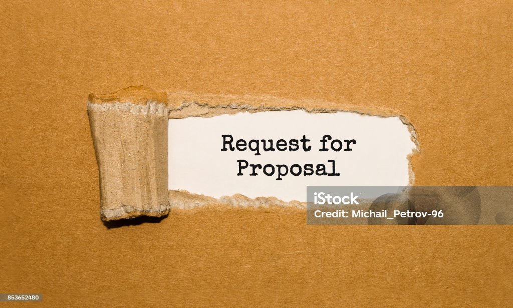 The text Request for Proposal appearing behind torn brown paper Sales Pitch Stock Photo