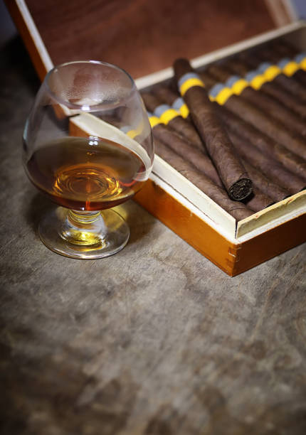 istock Large box of Cuban cigars on a wooden table 853652516