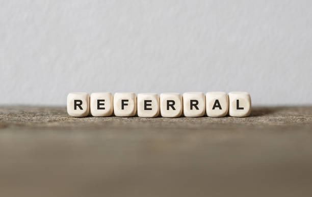 istock Word REFERRAL made with wood building blocks 853652520