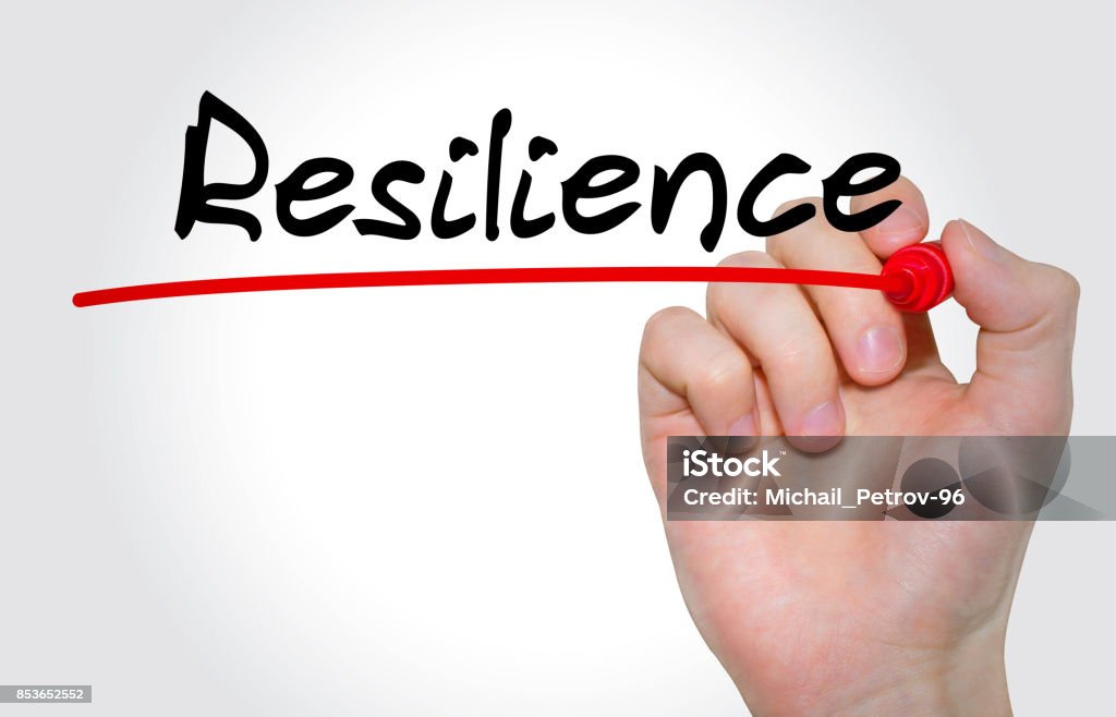 Hand writing inscription Resilience with marker, concept Resilience Stock Photo