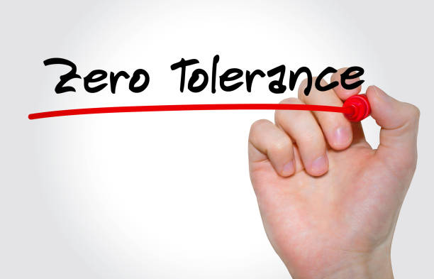 Hand writing inscription Zero Tolerance with marker, concept