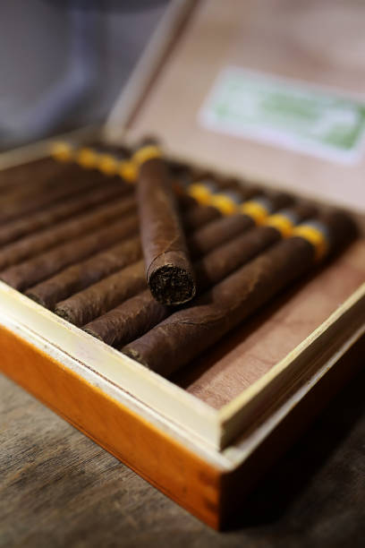 istock Large box of Cuban cigars on a wooden table 853653168