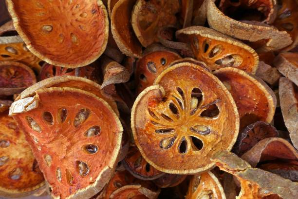 Dried Bael Fruit Stock Photo - Download Image Now - Bael, Fruit, Alternative Medicine - iStock Dried Bael Fruit Stock Photo - Download Image Now - Bael, Fruit, Alternative Medicine - iStock