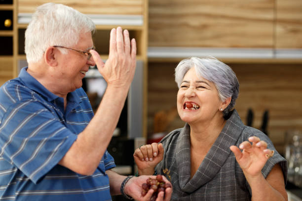 istock Happy elderly couple eating grapes 853668738
