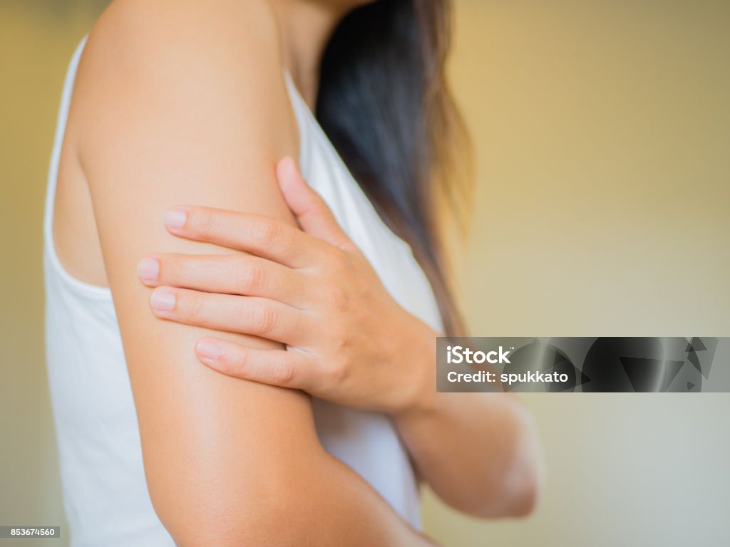 Closeup female's arm. Arm pain and injury. Health care and medical concept. Arm Stock Photo