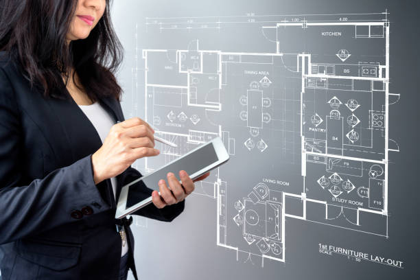 istock Architect / Interior designer working with modern futuristic virtual layout home 853681396