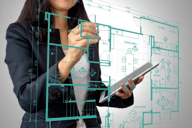 istock Architect / Interior designer working with modern futuristic virtual layout home 853681444