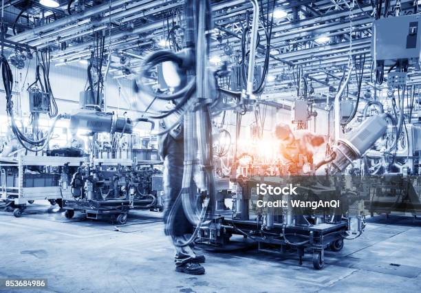 Robots Welding In A Car Factory Stock Photo - Download Image Now - Factory, Hydraulics, Automated