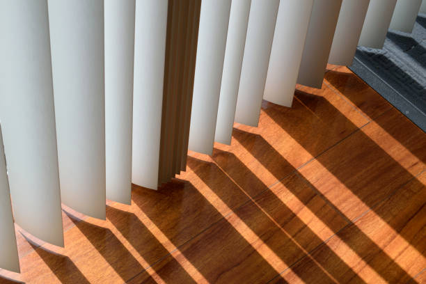 istock Sunlight Shines Through the Window Shades at Home 853685254