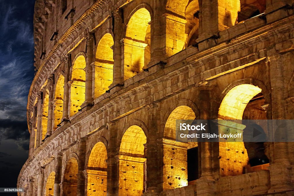 Famous coliseum of Rome at night Amphitheater Stock Photo