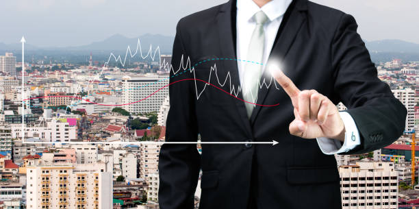 istock Businessman standing posture hand touch graph finance 853693356
