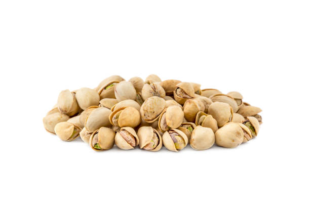 istock Heap of pistachios on white. 853696700