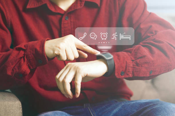 istock Businessman using futuristic smartwatch 853730948