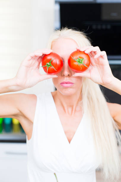 istock Happy woman cooks in the kitchen 853735258