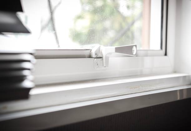 istock part of window blinds open in home, light from window outside image blurred background 853735922