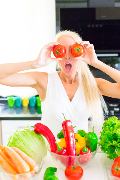 istock Happy woman cooks in the kitchen 853744752