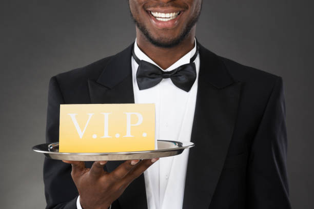 istock Waiter Serving Meal In Cloche 853752784