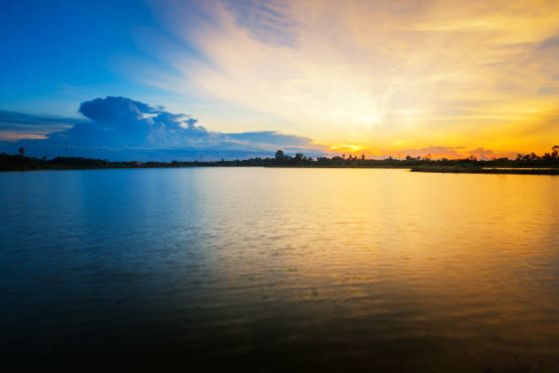 istock Beautiful sunset landscape with blue sky over lake 853760804