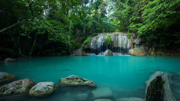 istock Breathtaking green waterfall at deep forest, Erawan waterfall located Kanchanaburi Province, Thailand 853760946