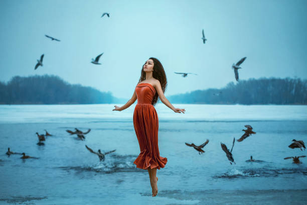 istock woman flies with the birds 853768906