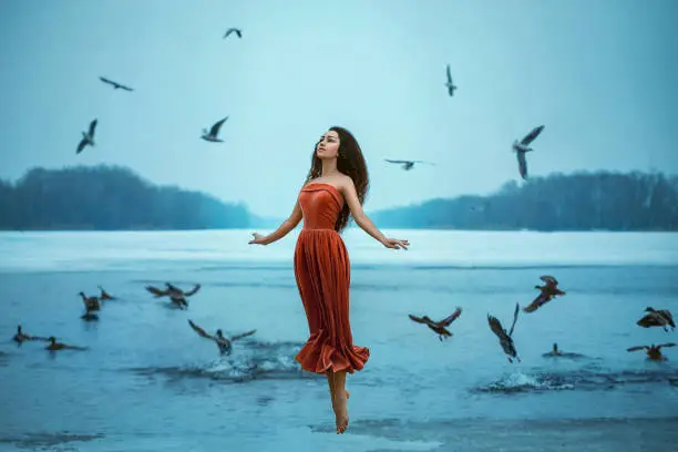 Photo of woman flies with the birds